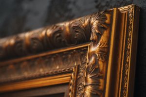 Beautiful golden frame with pattern close up